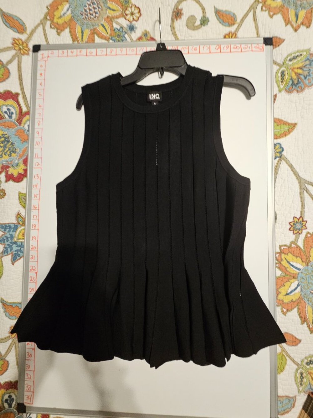 I.N.C. Black Sleeveless Top Flares at the bottom Size XL